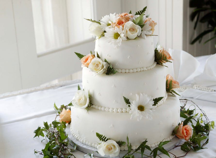 A close up of a wedding cake